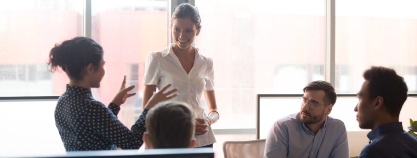 diverse group sit for training and cross training meeting